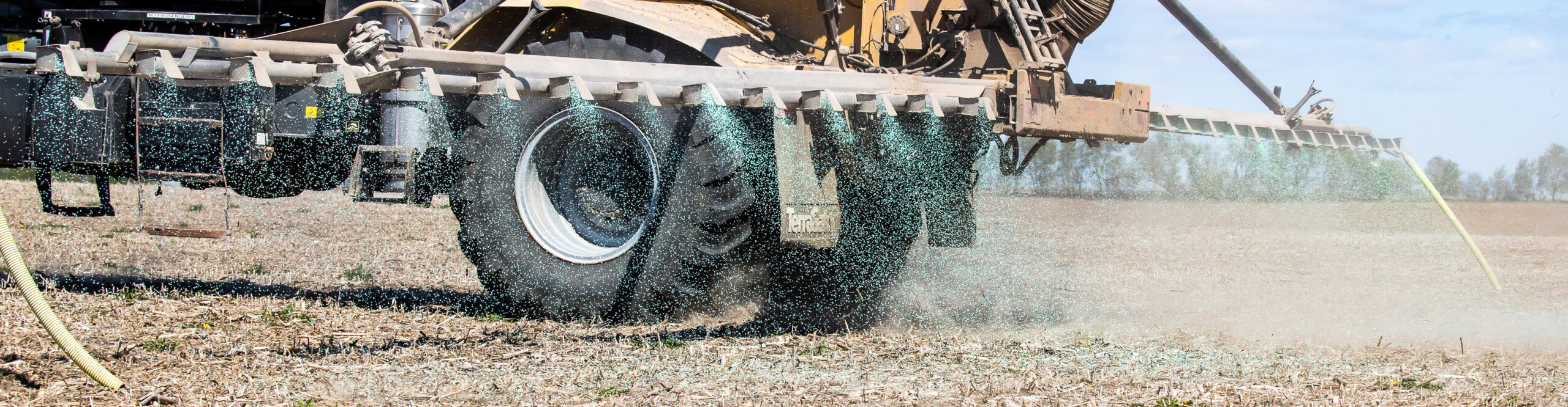 Crop nutrients being sprayed onto a field