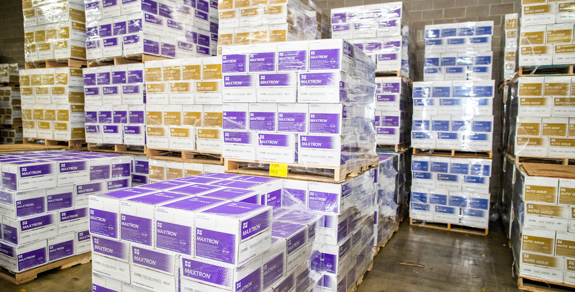 Pallet of Cenex branded lubricants in a warehouse