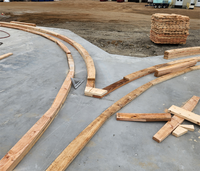 View of concrete slab of floor and forms for elevator bins
